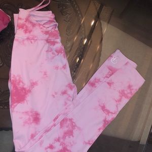 bombshell sportswear XS tiny snag in crotch color is faded white and pink
